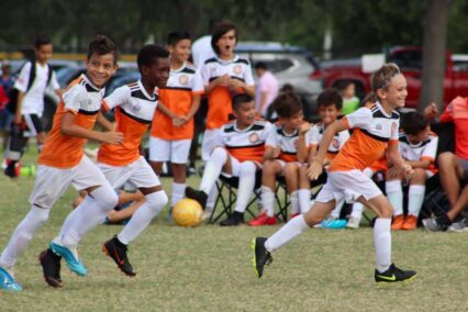 AC Miami players at a soccer match